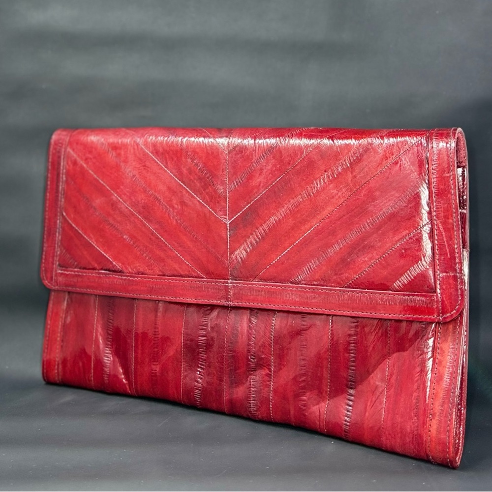 Vintage red gorgeous eel skin clutch.